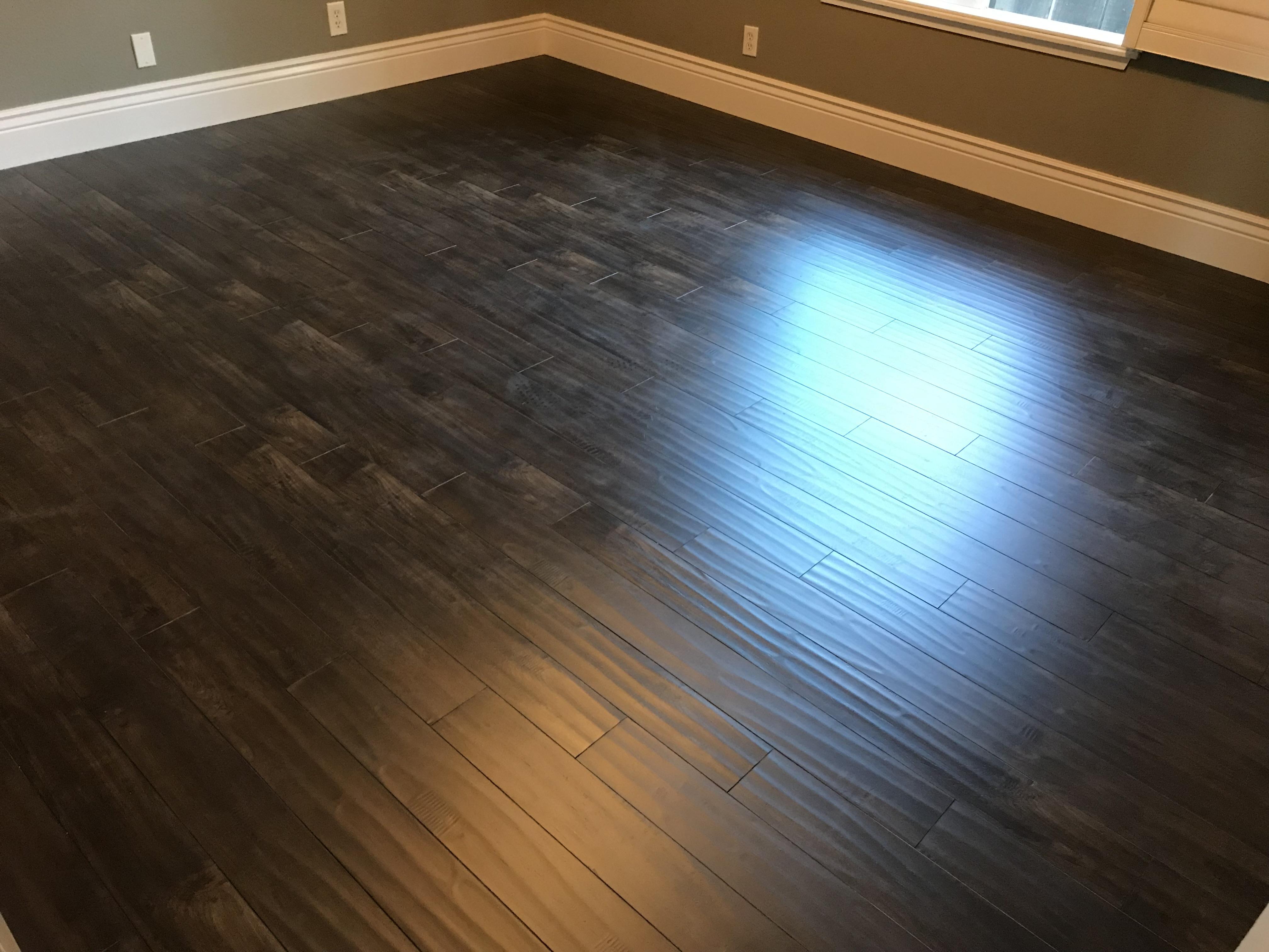 Dark hand-scraped hardwood floor in an El Dorado Hills, CA bedroom