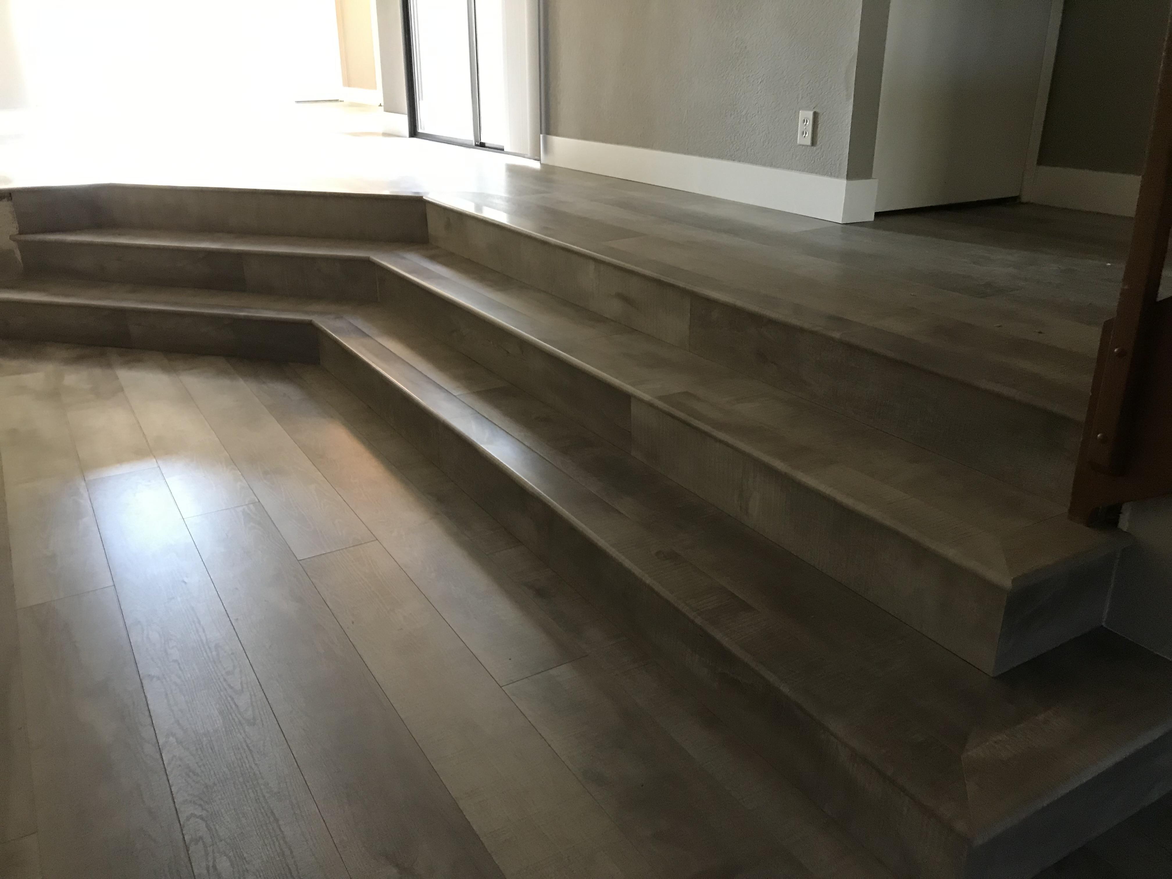 Gray vinyl plank steps and landing in a Loomis, CA home
