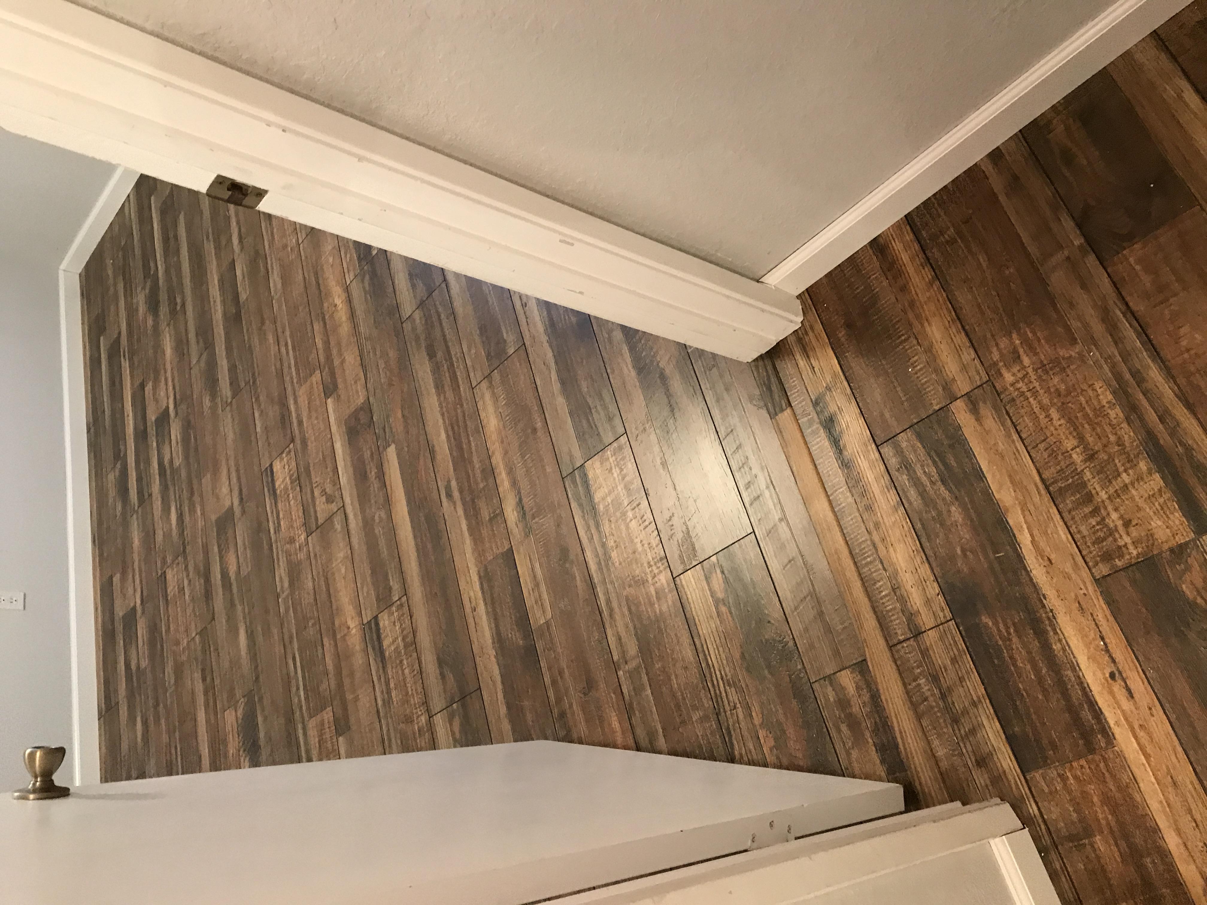 Rustic distressed wood-look plank flooring in an Antelope, CA room